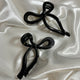 HAARSPANGE BLACK BOW.