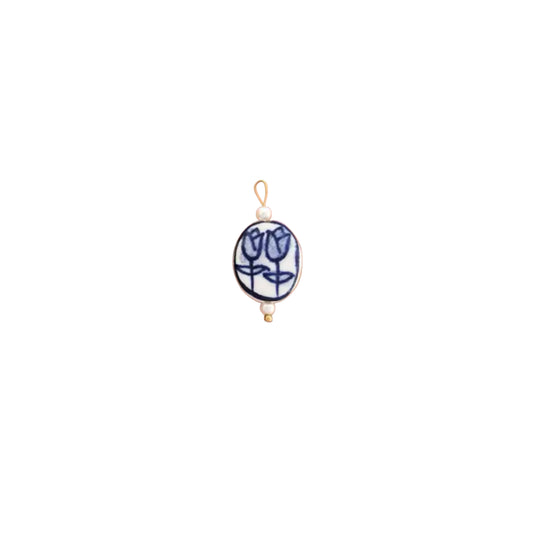 BLUE CERAMIC CHARM.